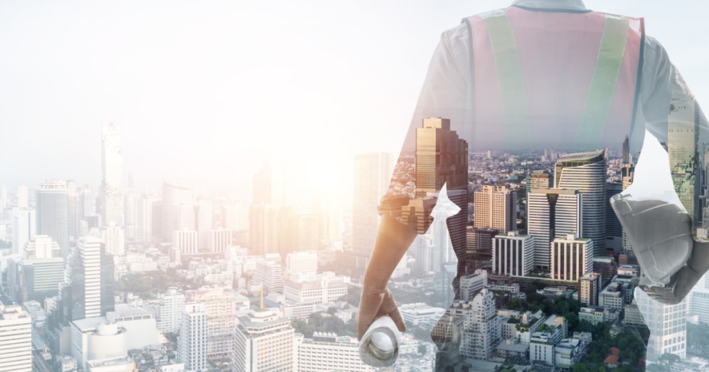 Double exposure of a construction engineer overlooking a modern city skyline, symbolizing urban development, architecture, and engineering innovation.
