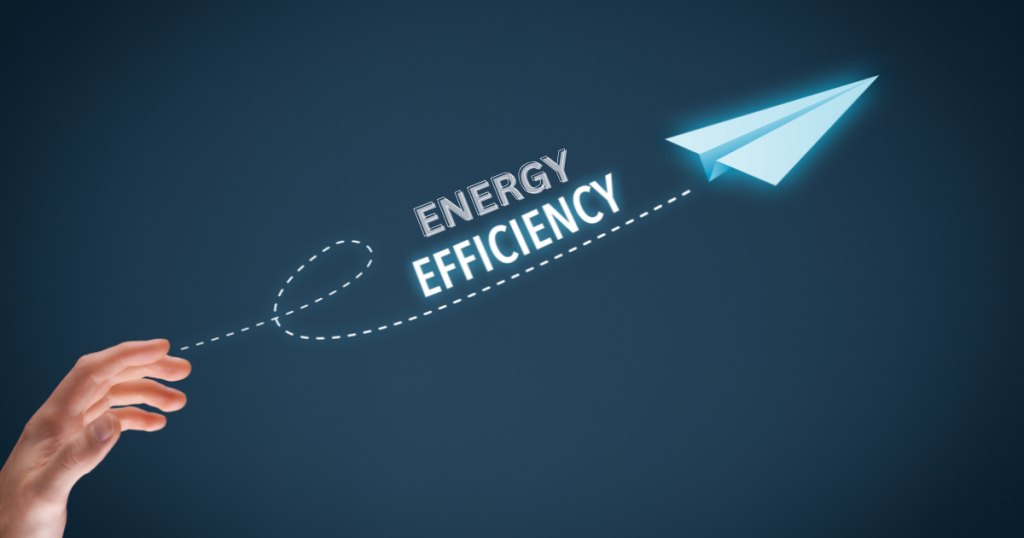Hand launching a paper airplane with the words 'Energy Efficiency' symbolizing innovation, sustainability, and smart energy solutions.